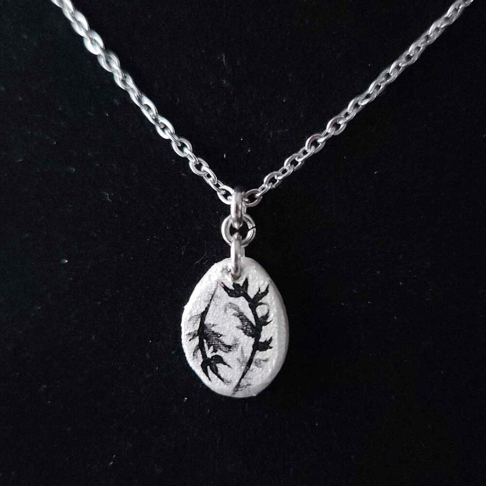 Vintage iridescent white pearl boho feather necklace with a small silver chain